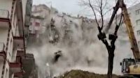 Çökme tehlikesi olan binanın yıkılma anları kamerada