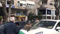 Caddeyi birbirine kattı: Bunalıma giren genç kadın lüks araçların kaputlarını yumrukladı etrafa saldırdı