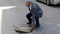 CHP'li Bornova'da kokudan durulmuyor: Mahalleli çözümü mazgallara halı ve kilim örtmekte buldu