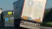 Yan yatan TIR'ın tehlikeli yolculuğu kamerada