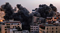 İşgalci İsrail kuvvetleri Gazze'de 13 katlı binayı vurarak yıktı