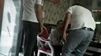 Müşterisine sarkıntılık eden taksiciye duraktaki arkadaşları meydan dayağı attı