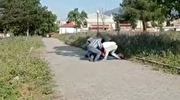 Genç kadının cebindeki telefonu çalan hırsızların yakalanma anları kamerada