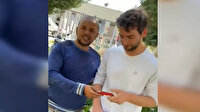Burdurlu çiftçi tarlasına inen Kanadalı paraşütçüye çikolata ikram etti