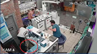 Telefoncuda panik anları: Dükkana karga dalınca tezgahın altına saklandı