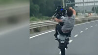 Motosikletlinin kilometrelerce tek teker üzerinde gittiği anlar kamerada