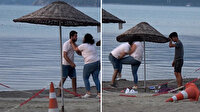 Plajda tartıştığı kişiyi tekme tokat döven kadın kamerada