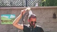 Sıcaktan bunalan Erzurumlu fenomenden ilginç serinleme yöntemi
