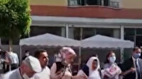 Oğlu güvenlik güçlerine teslim olan Ayşegül Biçer'in bayram günü: HDP binası önünde kurban kestirip halay çekti