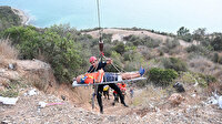 Adana'da ekipler kayalıklara düşen paraşütçü için seferber oldu