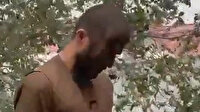 Taliban araç çaldığı gerekçesiyle Kabil'de bir Afgan'ın yüzünü siyaha boyadı