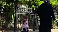 Çocuğu belinden iple bağlayıp gezdirdi: Sosyal medyadan tepki yağdı