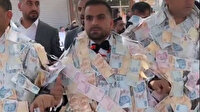Damat paraların içinde kayboldu: Aşiret düğününden bu görüntüler sosyal medyaya damga vurdu