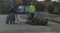 Yozgat'ta yürekleri ısıtan görüntüler: Odun taşıyan yaşlı kadının yardımına trafik polisi koştu