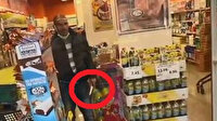 Bıçaklı soygun girişimi kamerada: Kasiyerin çığlıklarına esnaf yetişti
