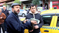 Taksici 150 bin lira değerinde döviz olan çantayı sahibine teslim etti