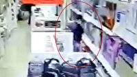 Şişli'de girdiği mağazadan kulaklık çalan hırsız kamerada