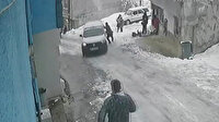 Buzlanan yolda kayan aracını tutarak durdurmaya çalıştı