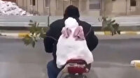 Antalya'da gülümseten görüntü: Motosikletin arkasına oturttuğu kardan adamı gezdirdi