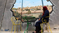 Filistin'i bölen Ayrım Duvarı grafitilerle süslendi