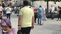 Eminönü'nde seyyar satıcı kadının darbeden adama kafa attılar