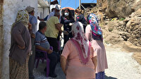 Alevlerin arasından komşuları kurtardı