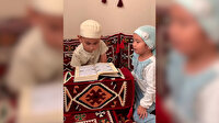 Kazakistanlı küçük çocuğun kız kardeşine Şems suresini ezberlettiği anlar kalpleri ısıttı