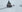 Siirt’te karda mahsur kalan yolcu minibüsü iş makinesiyle kurtarıldı