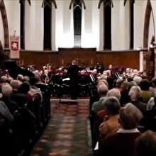 Konser sırasında trombonuna hapşıran müzisyen