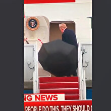 Trump'ın şemsiye ile imtihanı kamerada