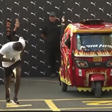 Usain Bolt gösteri yarışında triportöre büyük fark attı