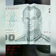 Kağıt banknotlardaki resimleri 'güldüren' adam