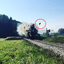 Trenin üstünden ters takla ile geçen adrenalin tutkunu adam