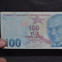 Kendisi 100 lira değeri 100 bin lira