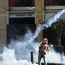 Beyrut'ta sokaklar savaş alınan döndü: 1 ölü, 238 yaralı