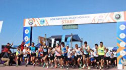 آلاف الرياضيين يشاركون في ماراثون منظمة شنغهاي بقرغيزستان