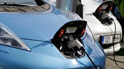 Electric cars cast growing shadow on profits