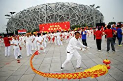 People celebrate after Beijing was chosen to host the 2022 Winter Olympics