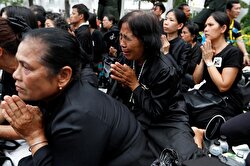 Mourners attend the funeral procession for Thailand's late King Bhumibol Adulyadej before the Royal Cremation Ceremony in Bangkok, Thailand.
