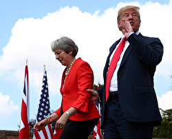Britain's Prime Minister Theresa May and U.S. President Donald Trump walk away after holding a joint news conference at Chequers, the official country residence of the Prime Minister, near Aylesbury, Britain, July 13, 2018. Reuters photographer Hannah McKay: 