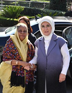 Turkey's first lady Emine Erdoğan (R) poses for a photo with a leader's wife while hosting a luncheon for wives of the leaders, who attend the extraordinary summit of Organization of Islamic Cooperation (OIC) in Istanbul, Turkey on December 13, 2017.