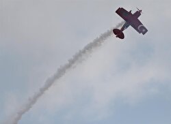 Semin Öztürk, Turkey's first professional female aerobatic pilot performs a demonstration flight with her 'Pitts S2-B' plane that has Lycoming engine with 360 horsepower, in Eskisehir, Turkey on July 01, 2018. A 27-year-old aerobatic pilot Semin experienced her first aerobatic flight performing when she was 12 years old with her father Ali Ismet Ozturk who is also an aerobatic pilot. On 19 September 2015, she realized her first airshow at Sivrihisar General Aviation Center. Ozturk will attend the Aeromania Airshow which will take place between July 14-15. The Aeromania Airshow to host 35 aerobatic pilots from many countries.  