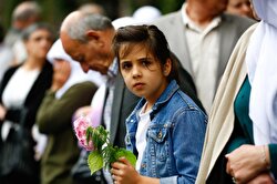 The remains of 35 Srebrenica genocide victims were placed on a truck laden with flowers in the Bosnian city of Visoko on Monday morning for their final journey to a cemetery.​
