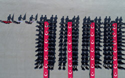 BURSA, TURKEY - AUGUST 7: A drone photo shows newly graduated police officers swear an oath during a graduation ceremony at the Police Vocational Training Center (POMEM) in Bursa, Turkey on August 7, 2019.

