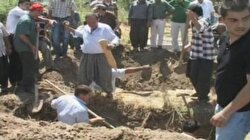 Katliam kurbanları toprağa verildi