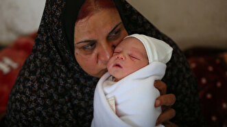 Palestinian woman gives birth in UNRWA school during Israeli attacks