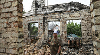 67-year-old Ukrainian woman lives in basement of her destroyed home as Russia forges on