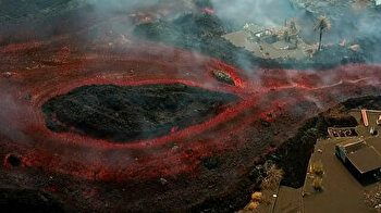 Molten lava flows deadly on La Palma, swallowing buildings in infernal blaze
