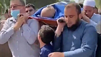 Palestinian boy cries 'Goodbye, Dad' after Israel's Gaza bombings kill his father