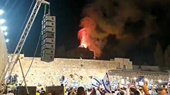 Hardline Israelis jubilant as they watch fire burning at Al-Aqsa compound